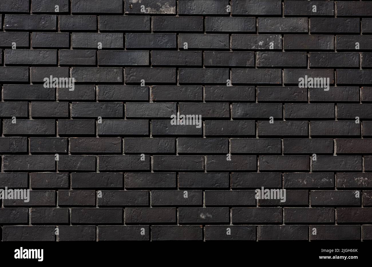 black brick wall, background for design. dark texture Stock Photo Alamy