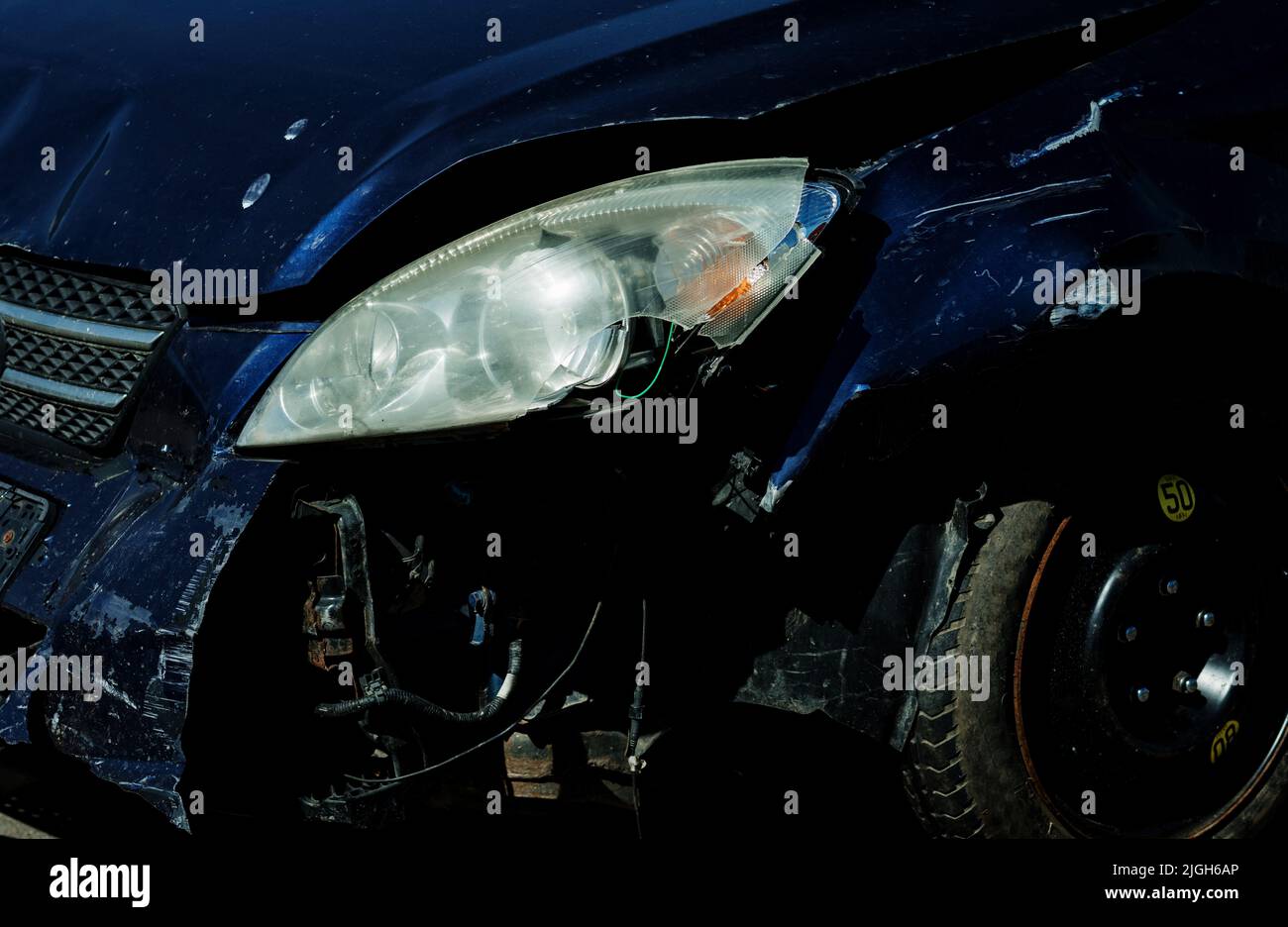 Broken car headlight, blue automobile. smashed headlights Stock Photo