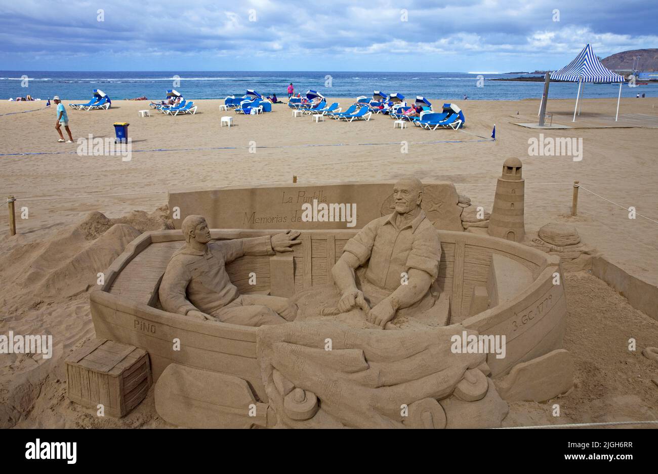 Sand art, fishermen in a fishing boat made with sand, Playa de las Canteras, town beach of Las Palmas, Grand Canary, Canary islands, Spain, Europe Stock Photo