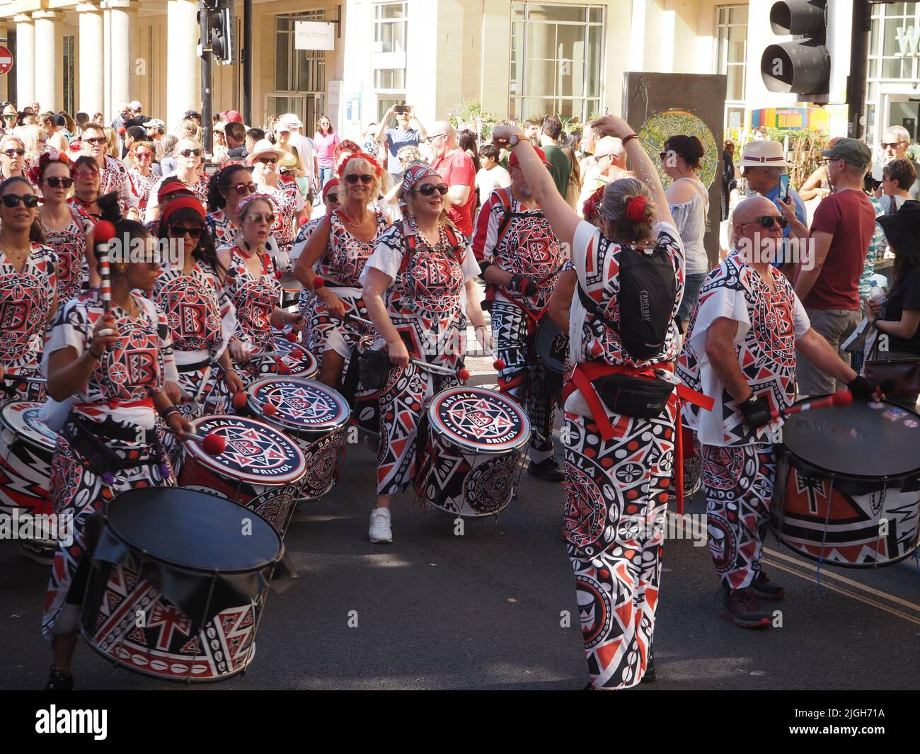 Batala Bristol samba reggae percussion band, Bath Carnival parade, Bath, Somerset England 09 July 2022. Stock Photo