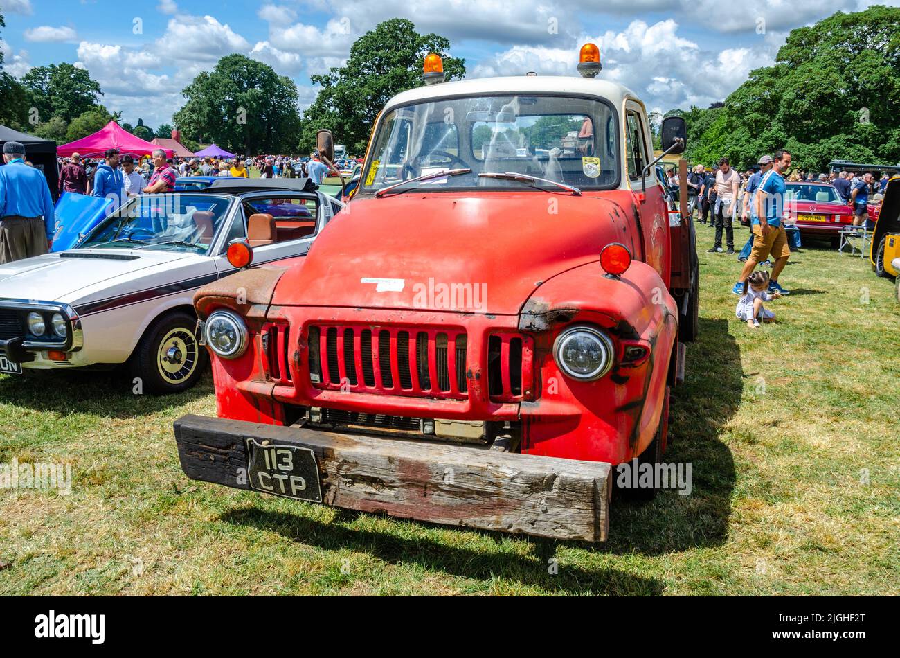Front view of a vintage J Series Bedford tow truck with a wooden sleeper fitted as a bumper at The Berkshire Motor Show in Reading, UK Stock Photo