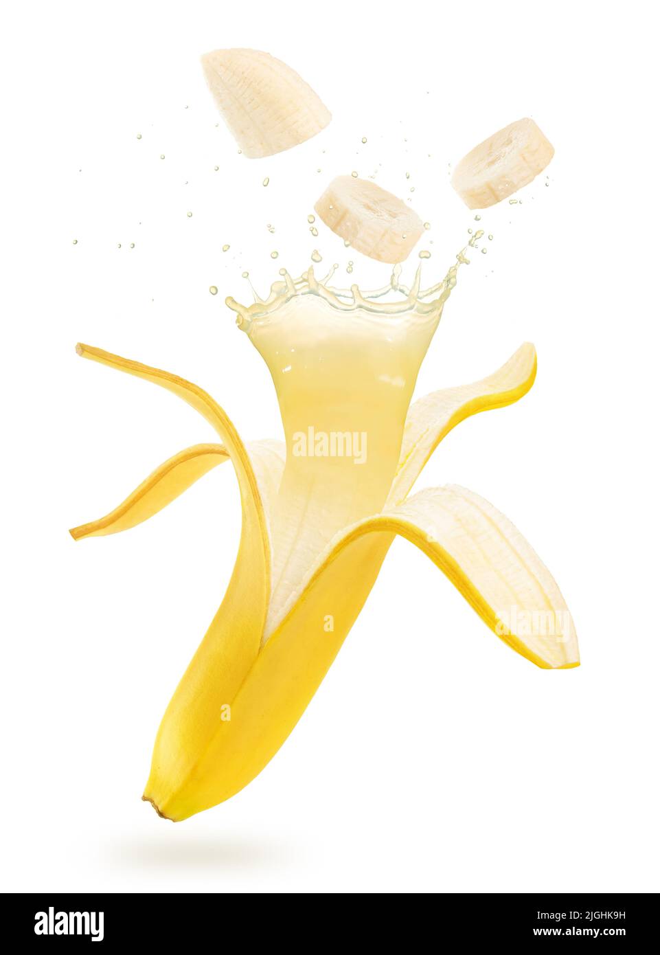 juice splashing out of an open and sliced banana floating isolated on white background Stock Photo