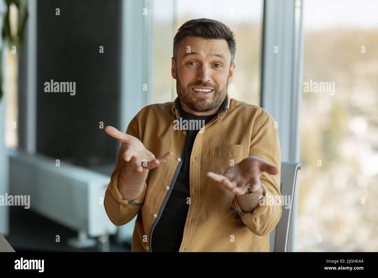 Business Man Talking Video Calling Communicating Online Sitting In Office Stock Photo