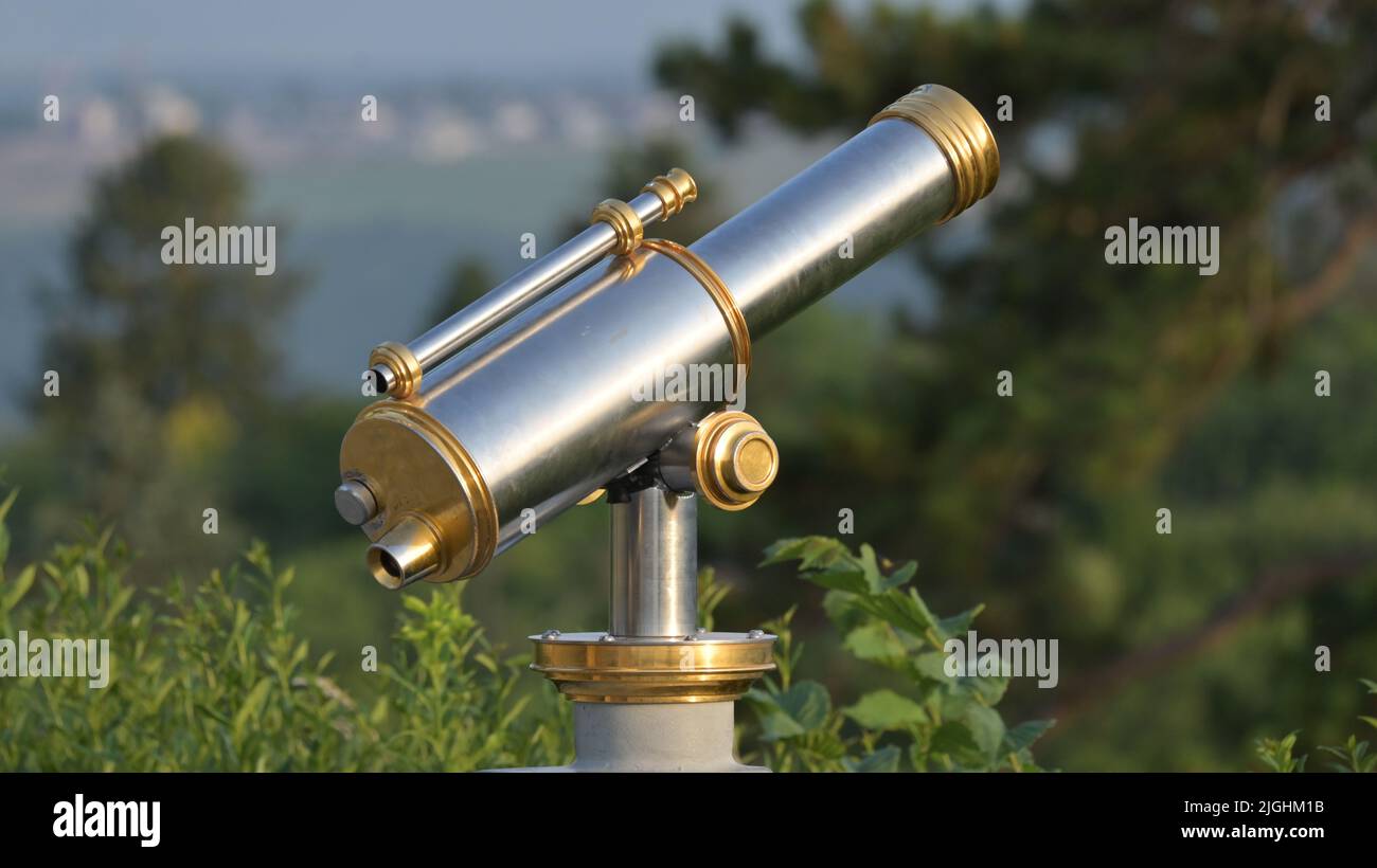 A silver and golden observation telescope Stock Photo Alamy