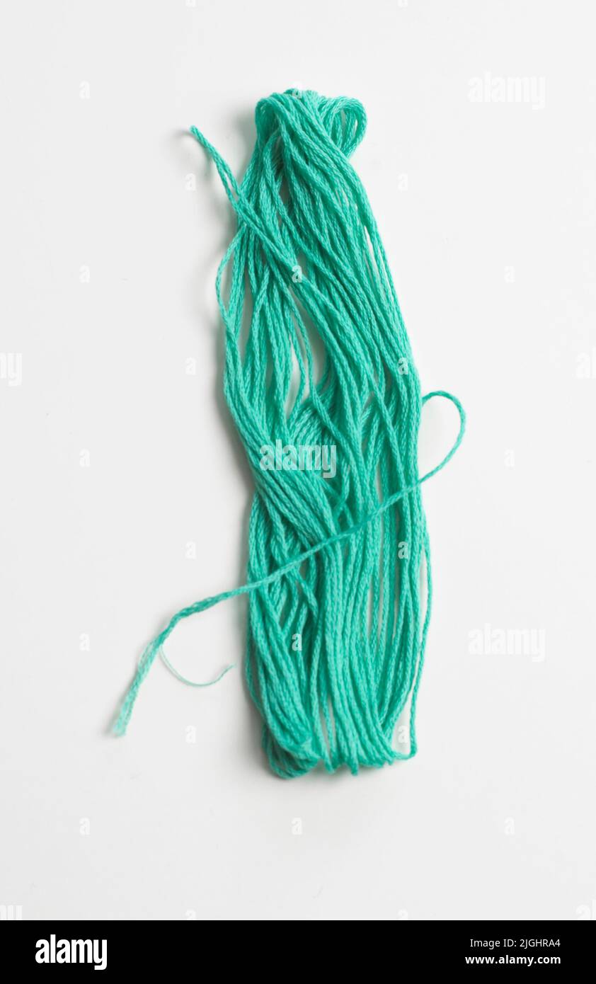 Turquoise yarn on white background, close-up Stock Photo