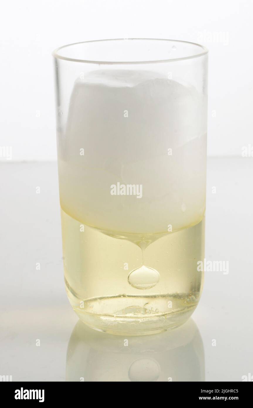 Marshmallow floating on oil Stock Photo