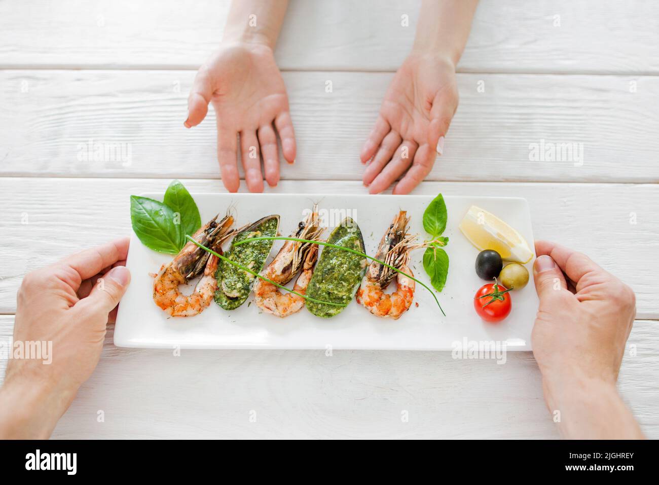 Restaurant serving of seafood meal Stock Photo Alamy