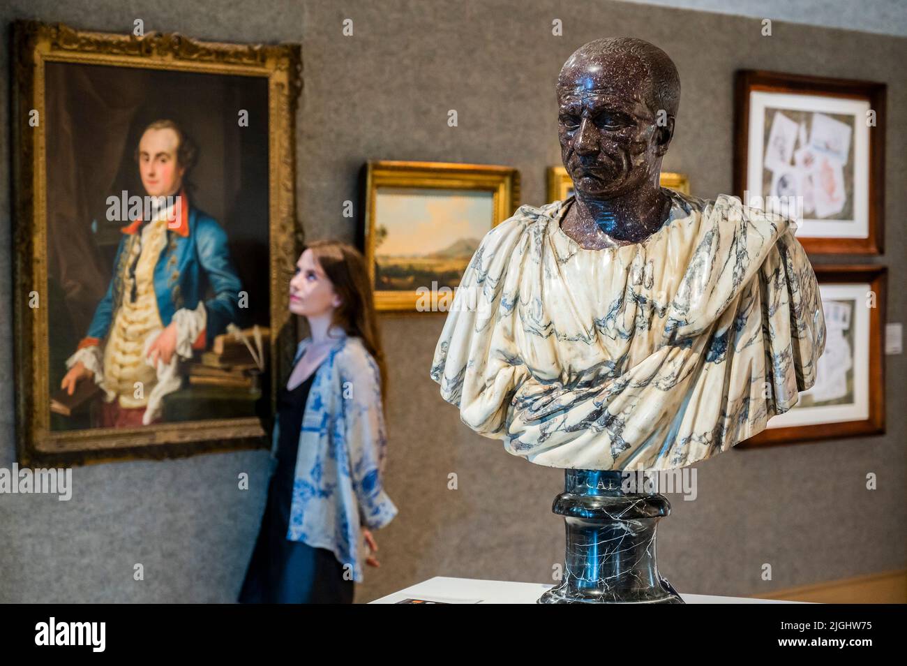 London, UK. 11th July, 2022. Portrait of Edward Solly by Pompeo Batoni. Estimate: £120,000-180,000 with and Italian Bust of a Roman Emporer, c18/early 19the Century, est £7000-10,000 and other works - The Grand Tour sale at Bonhams New Bond Street. The sale itself will take place on Thursday 14 July in London Credit: Guy Bell/Alamy Live News Stock Photo