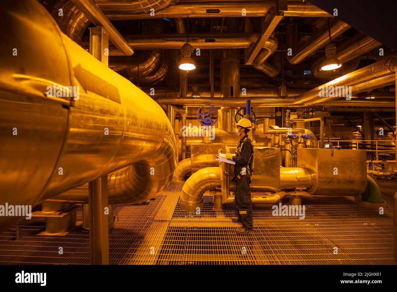 Male to be worker visual inspection inside control room valve tank ...