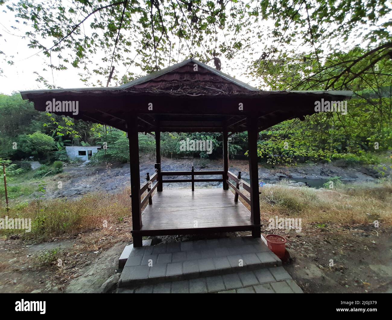 A gazebo sitting place at a recreation place at a river in Yogyakarta
