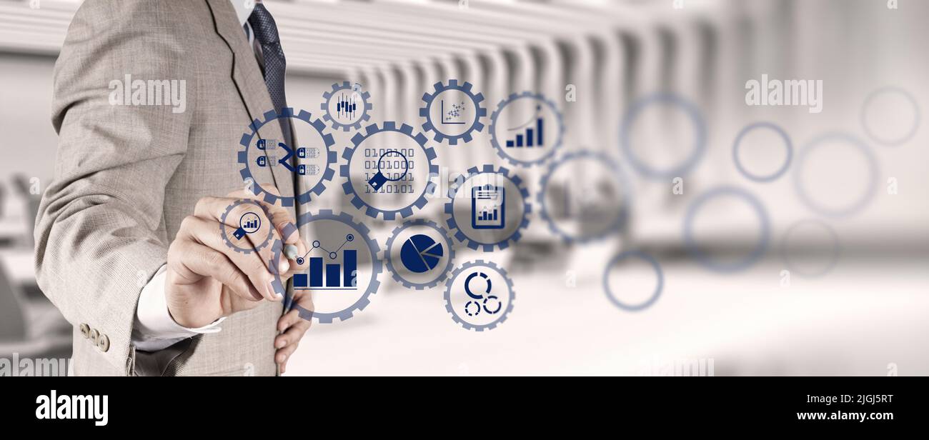 A business data analytics expert working on a digital render of ...