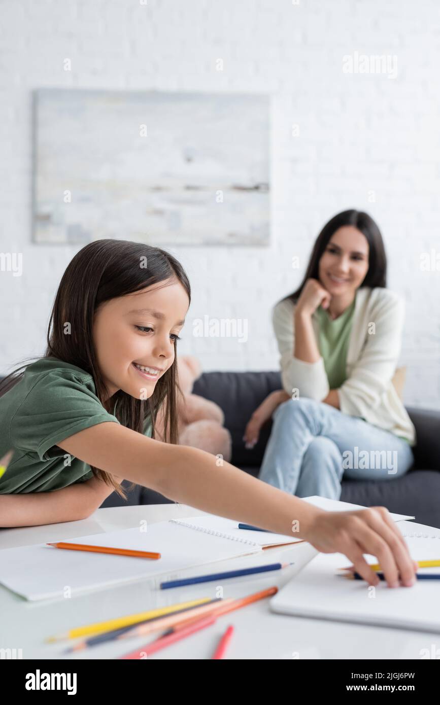 Happy girl reaching colorful hi-res stock photography and images - Alamy