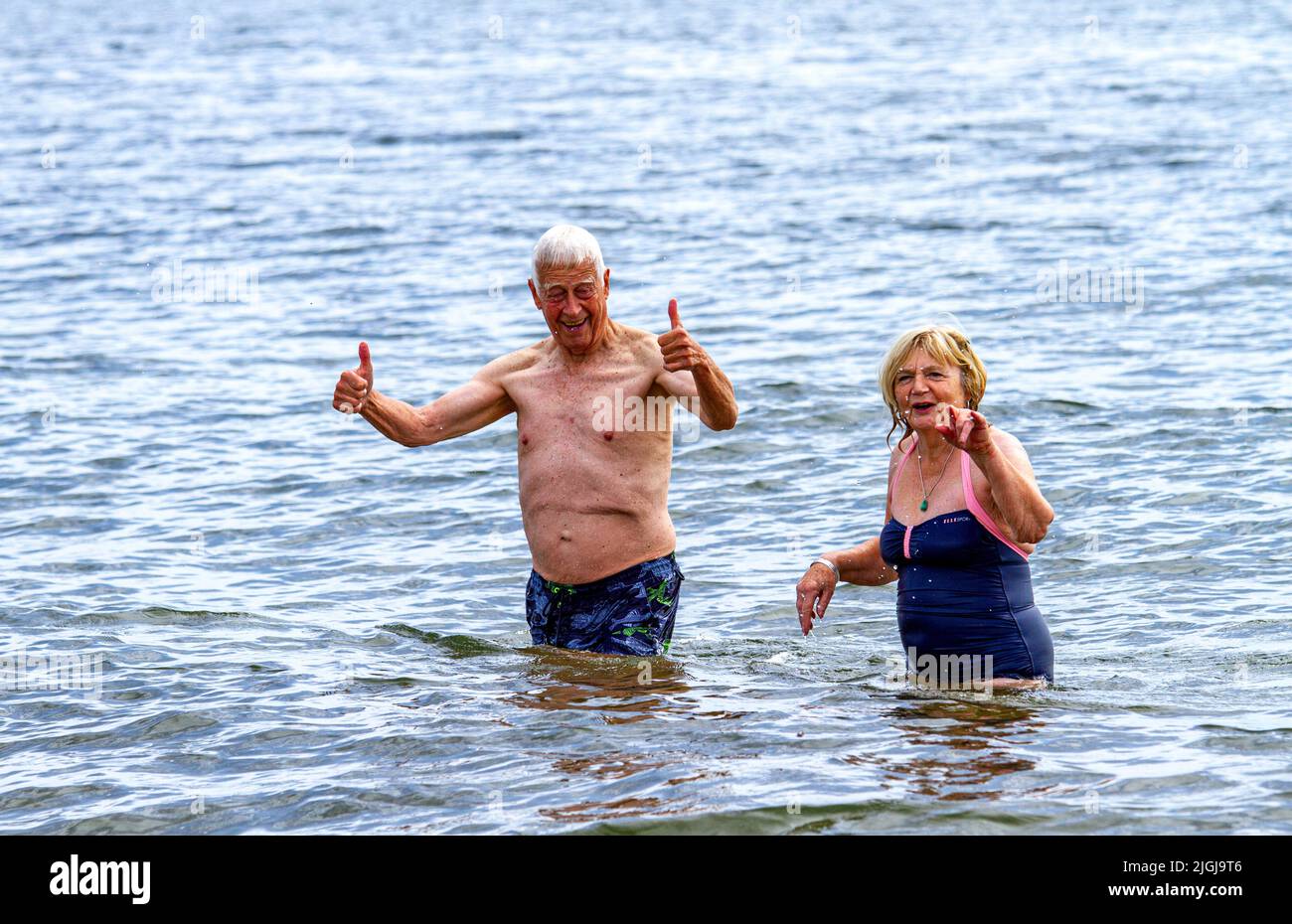 Dundee, Tayside, Scotland, UK. 11th July, 2022. UK Weather: The temperature in North East Scotland reached 24°C. The beautiful summer weather drew beach-goers and sunbathers to Dundee Broughty Ferry beach to soak up the warm July sunshine. Credit: Dundee Photographics/Alamy Live News Stock Photo