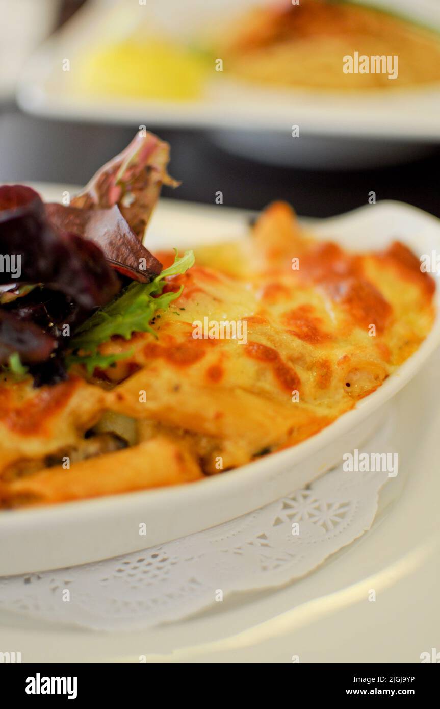 A plate of ovenbaked Italian Penne pasta Stock Photo Alamy