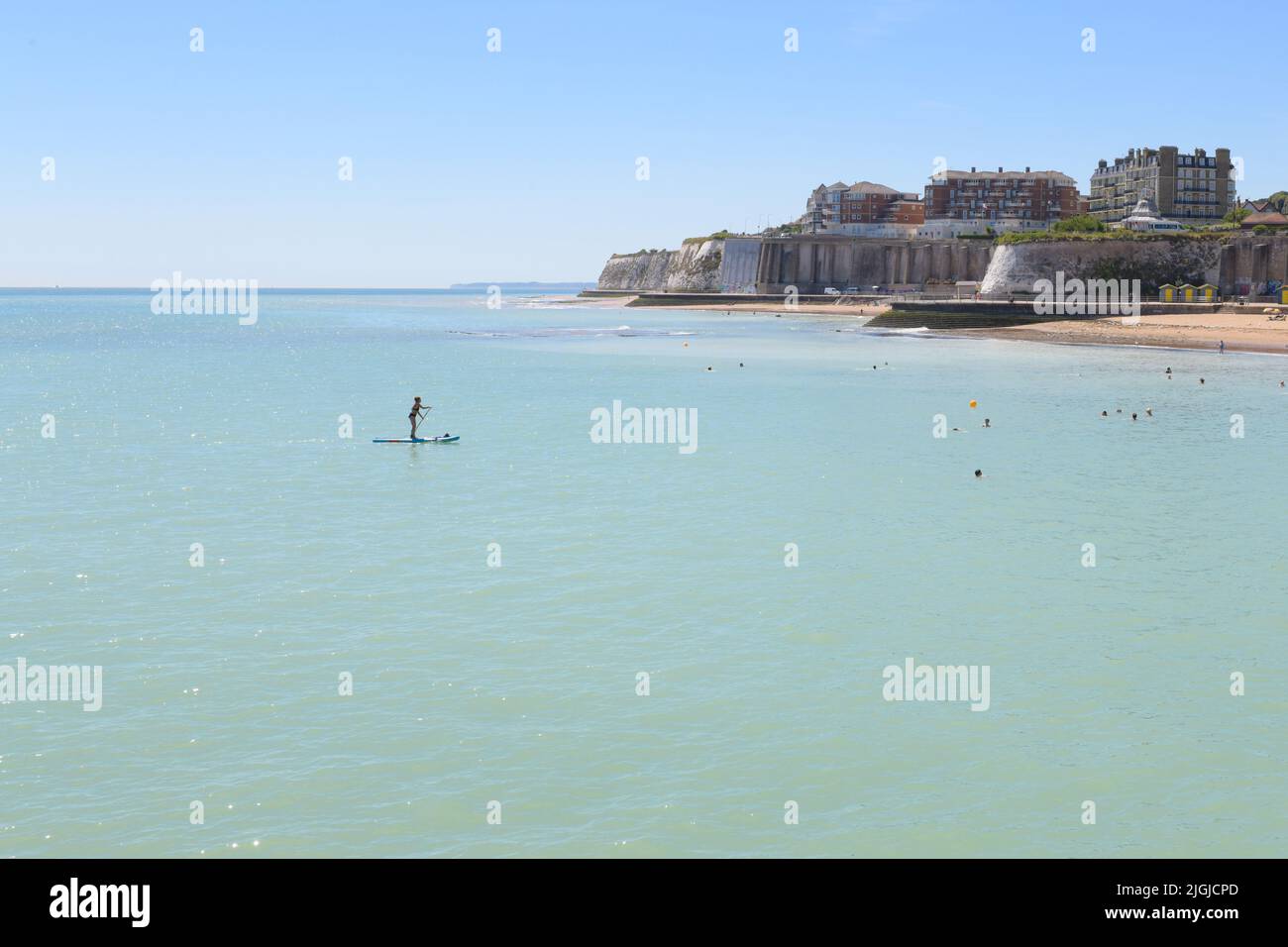 Broadstairs, Kent, England, UK. 11th July, 2022. UK weather: a paddle boarder enjoying a hot sunny day in Broadstairs, Kent Credit: Kay Roxby/Alamy Live News Stock Photo