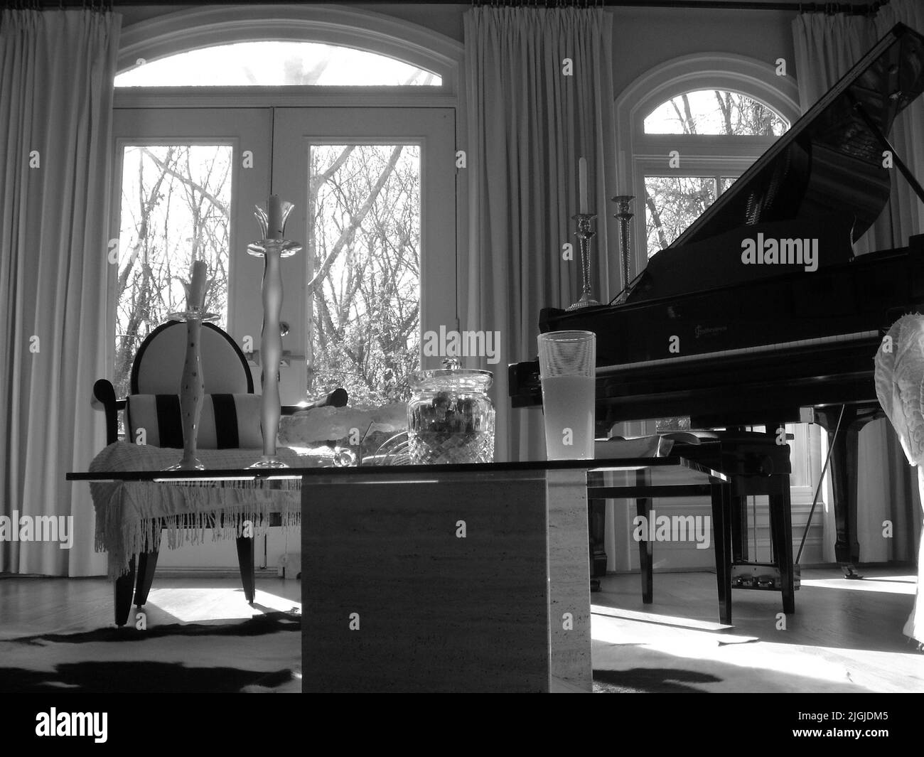 Black and White Elegant Living Room with Baby Grand Piano Stock Photo ...