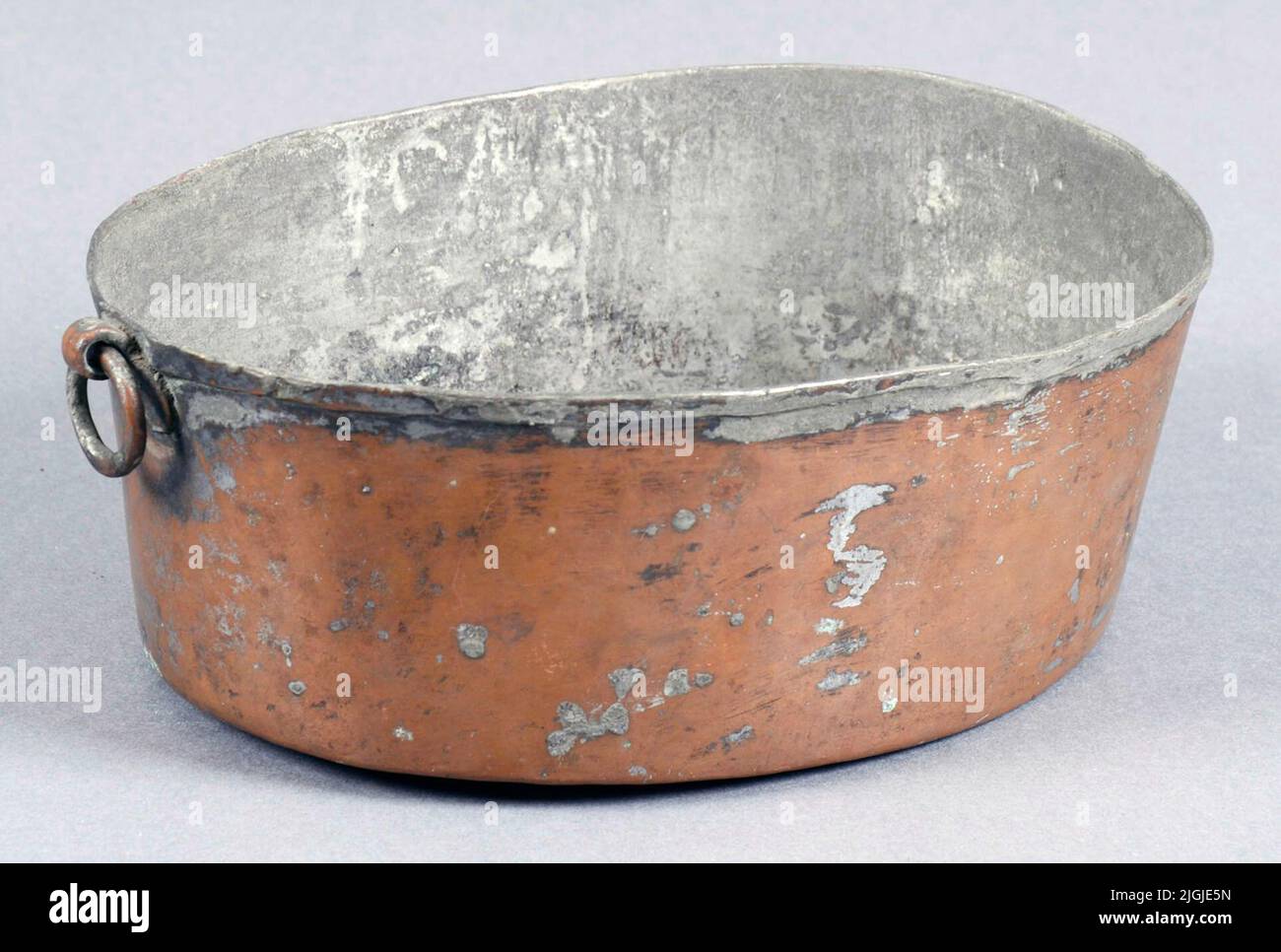 Bunke Bunke of copper, oval inside, and with a ring as a handle. The ...