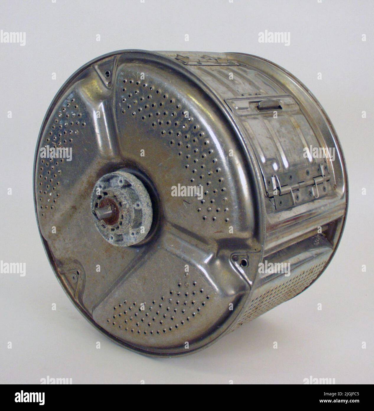 Sump Cylindrical washing machine drum for top fed machine. Perforated