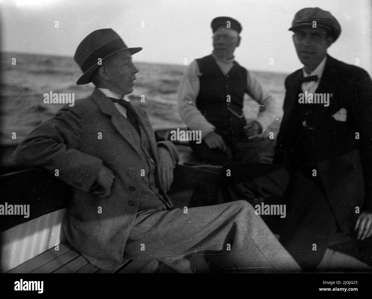 men-by-boat-unknown-place-stock-photo-alamy
