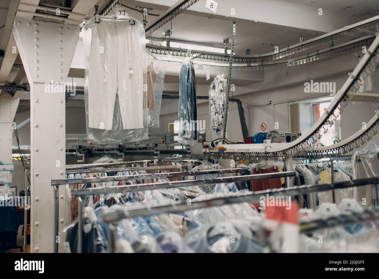 Dry cleaning clothes. Clean cloth chemical process. Laundry industrial