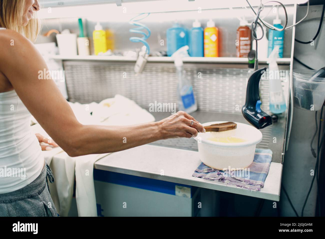 Dry cleaning clothes. Clean cloth chemical process. Laundry industrial