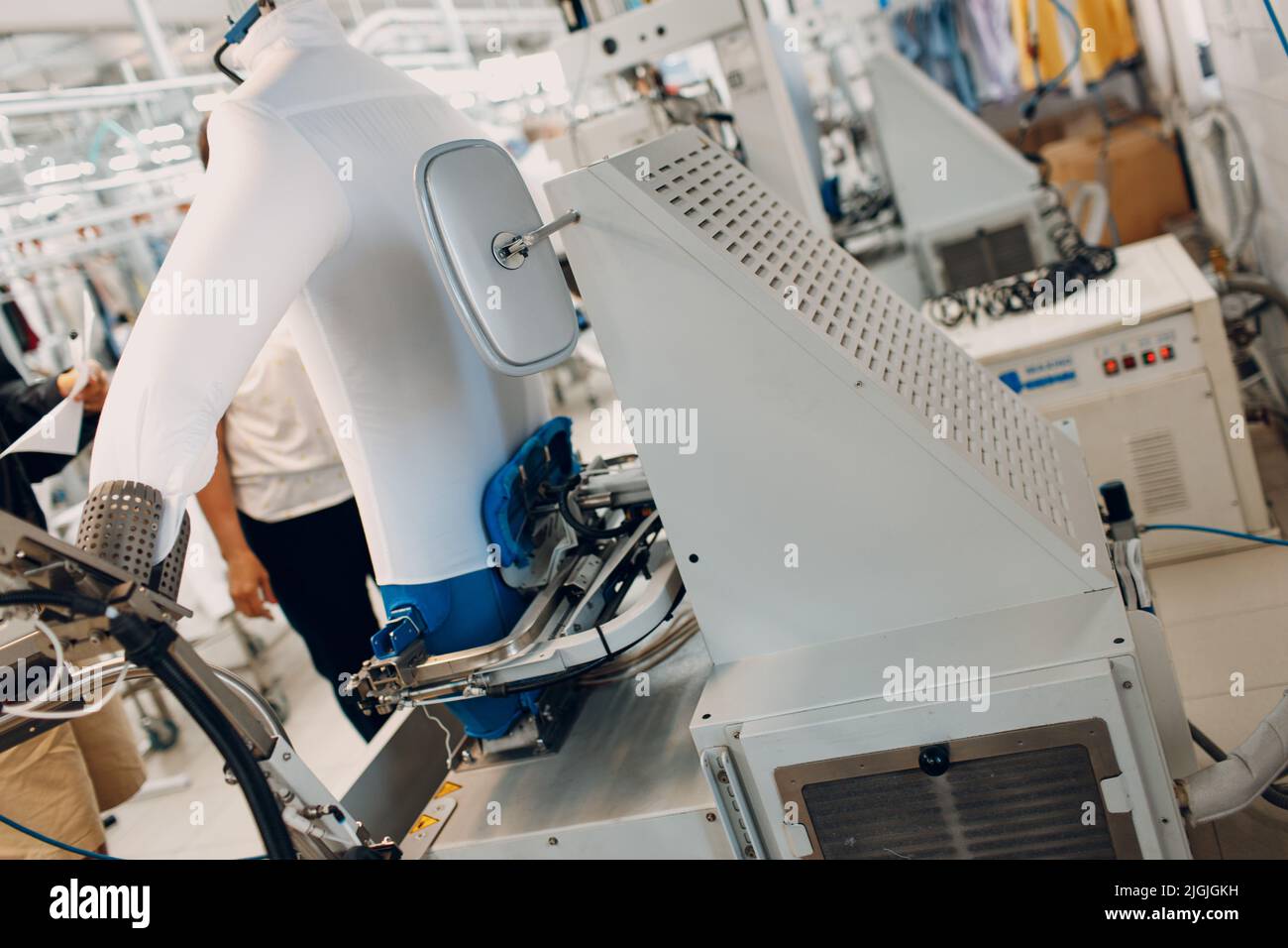 Dry cleaning steamer clothes. Clean cloth chemical process. Laundry industrial drycleaning