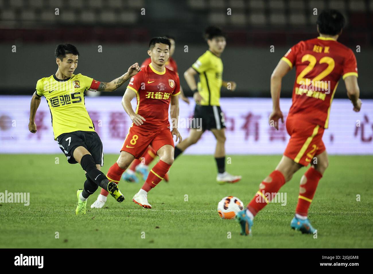 Dalian, China's Liaoning Province. 11th July, 2022. Wei Shihao (1st L) of Guangzhou passes the