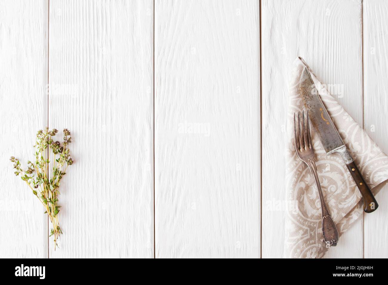 White wooden background with old cutlery, flat lay Stock Photo - Alamy