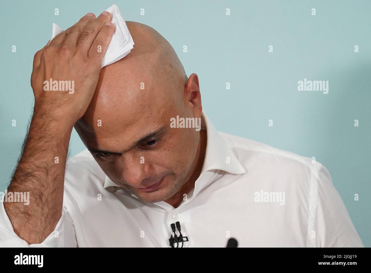 Sajid Javid mops his head during the launch of his campaign to be Conservative Party leader and Prime Minister, at the Cinnamon Club in London. Picture date: Monday July 11, 2022. Stock Photo