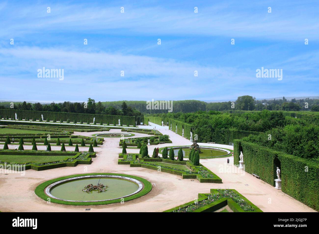 Garden at the Chateau de Versailles with carefully sculpted shrubbery Stock Photo