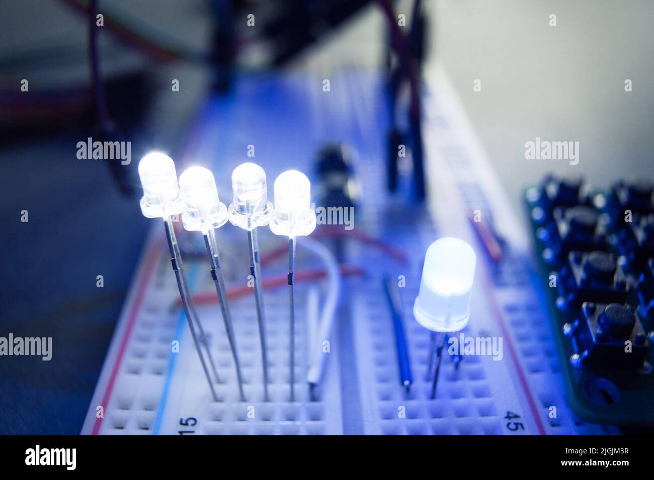 LED Light-emitting diodes on electrical breadboard Stock Photo