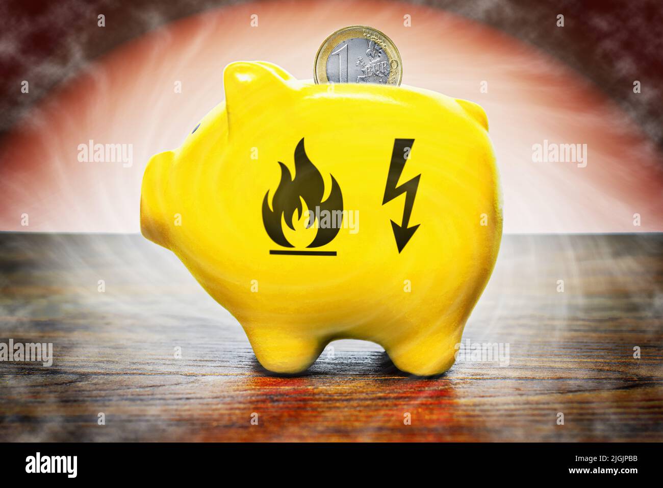 Gas And Energy Symbol On A Piggy Bank Stock Photo