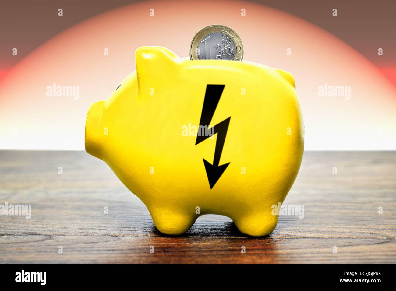 Energy Symbol On A Piggy Bank Stock Photo