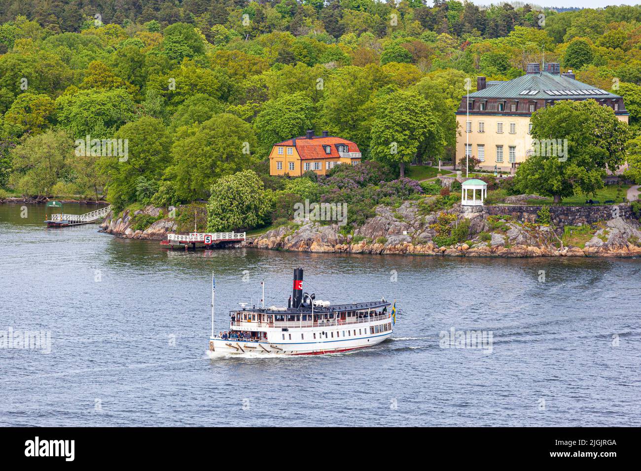 Tourist boat MV Ostana I (built 1906) leaving Djurgården in the Stockholm Archipelago, Sweden Stock Photo
