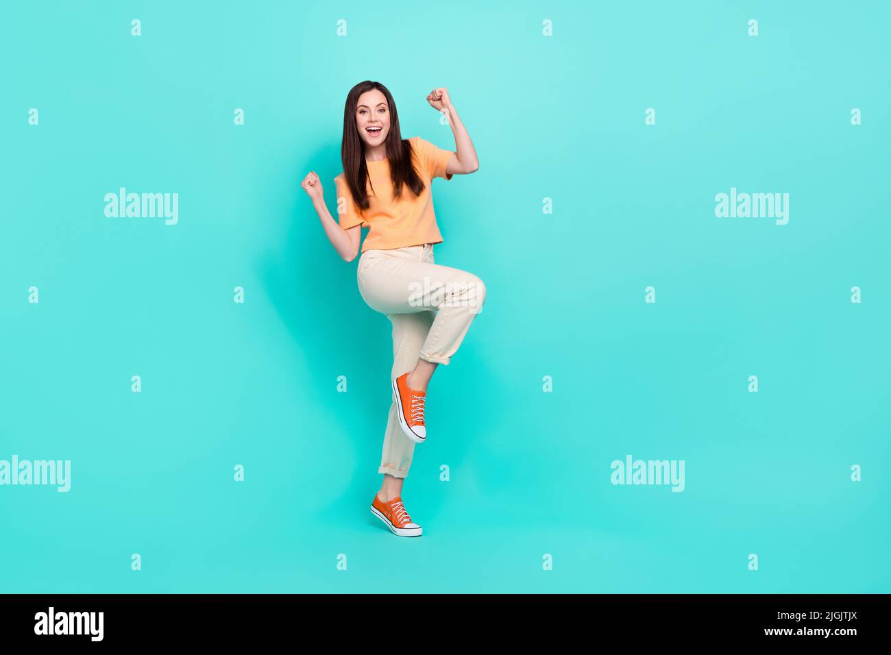 Full size photo of delighted satisfied lady raise fists up ...