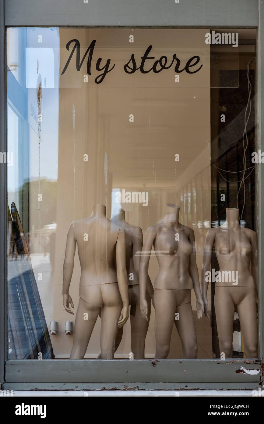 Disused Mannequins in Storefront, Zadar, Croatia Stock Photo
