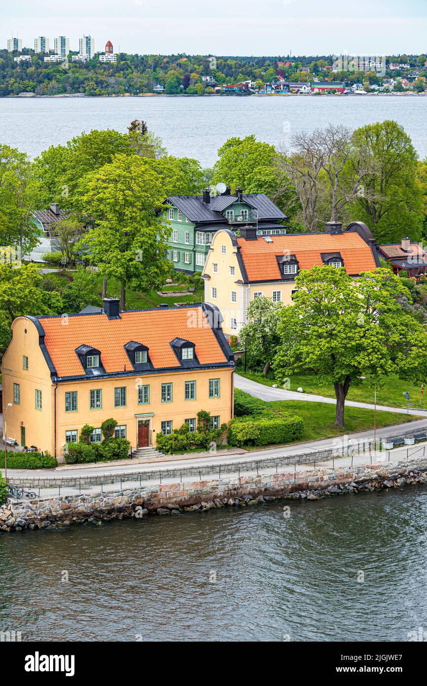 Traditional waterside properties at Blockhusudden on Djurgården Island in the Stockholm Archipelago, Sweden Stock Photo