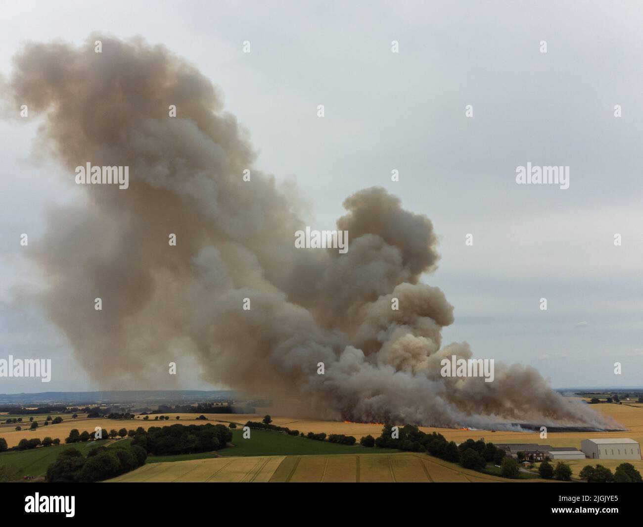 Ripon, North Yorkshire, UK. 11th July, 2022. Smoke and flames fill the