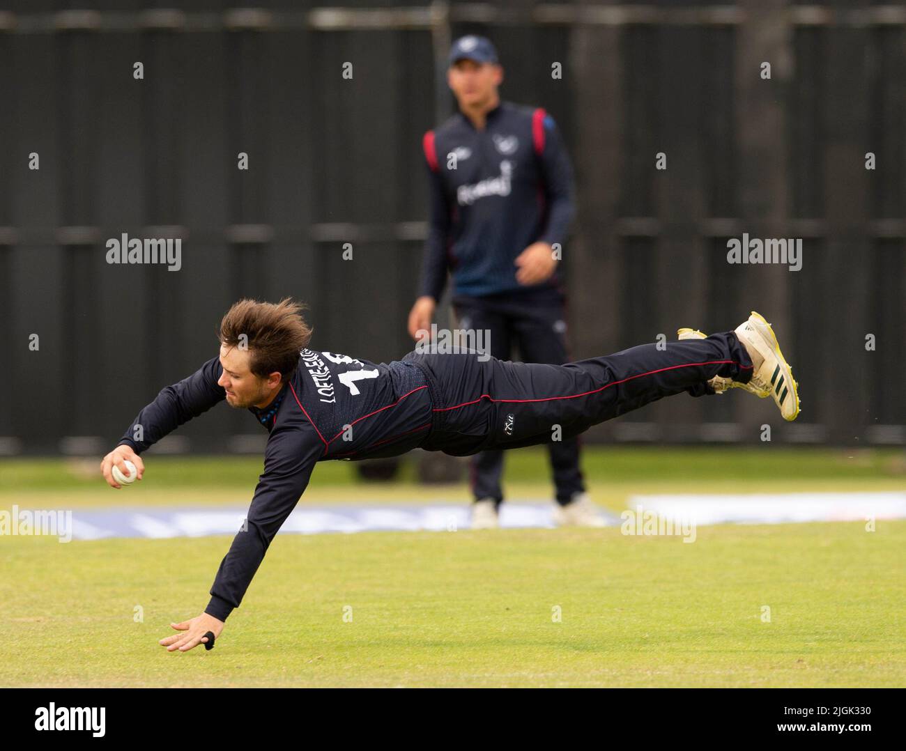 ICC Men's Cricket World Cup League 2 - Nepal v, Namibia. 10th July, 2022. Nepal take on Namibia in the ICC Men's Cricket World Cup League 2 at Cambusdoon, Ayr. Pic shows: Great fielding by Namibia's Jan Nicol Loftie-Eaton, Credit: Ian Jacobs/Alamy Live News Stock Photo