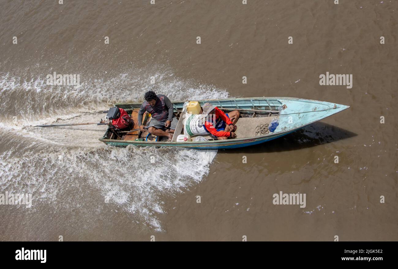 SAMUT PRAKAN, THAILAND, MAY 05 2022, A traditional transport in Thailand - the boat with long rod of engine, sailing on a water canal. Stock Photo