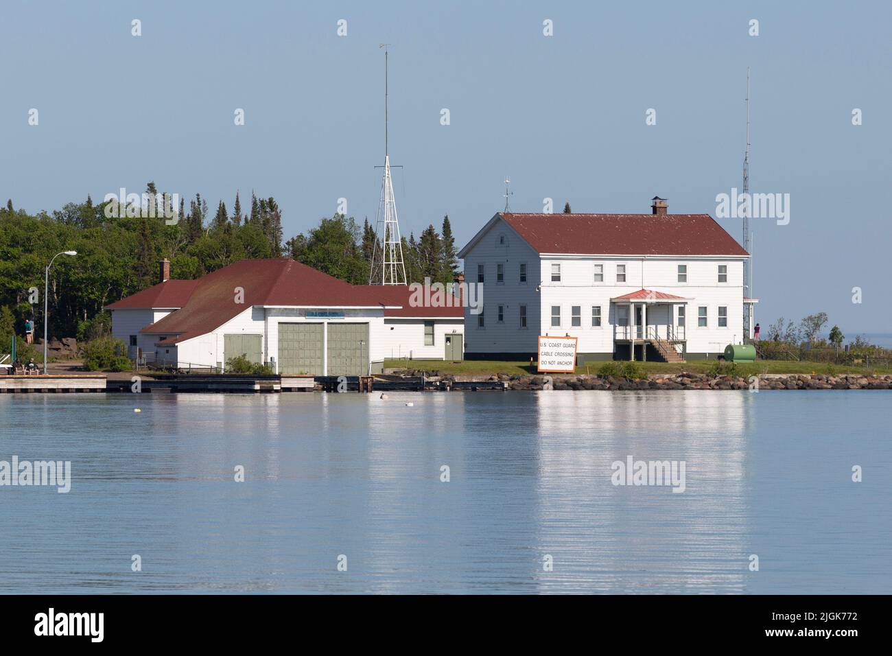The 1928 Station House of the Department of Homeland Security U.S. Coast Guard Station North Superior at Grand Marais harbor, Minnesota. Stock Photo