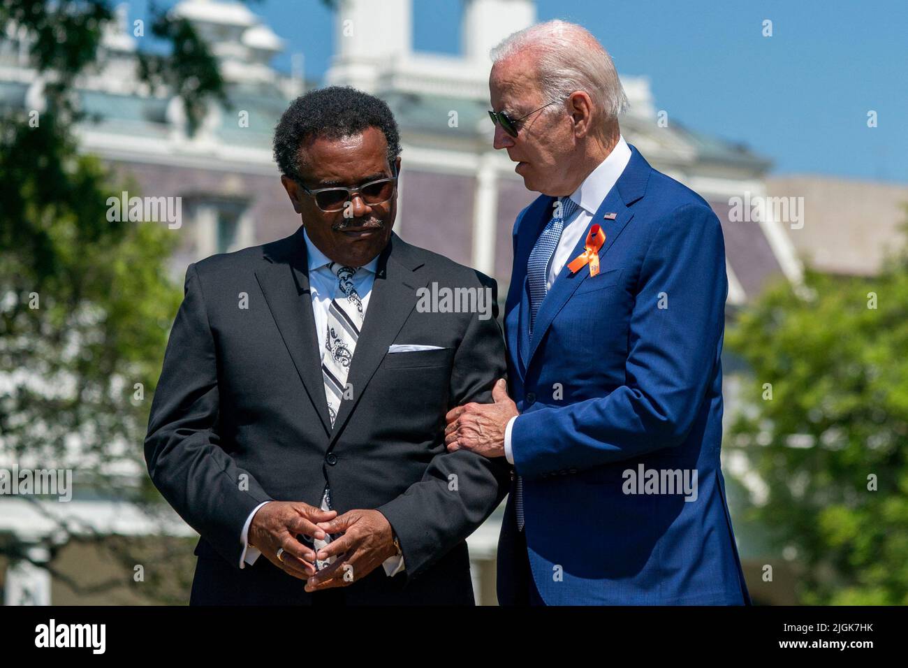 US President Joe Biden talks with Garnell Whitfield, Jr., son of the ...