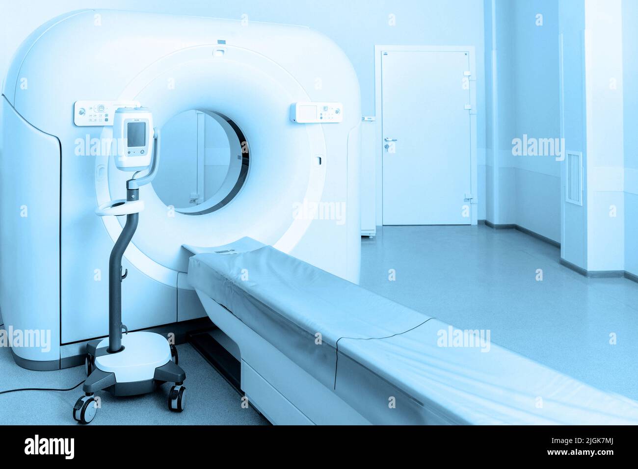 Medical CT or MRI Scan in the modern hospital laboratory. Interior of radiography department. Technologically advanced equipment in white room Stock Photo