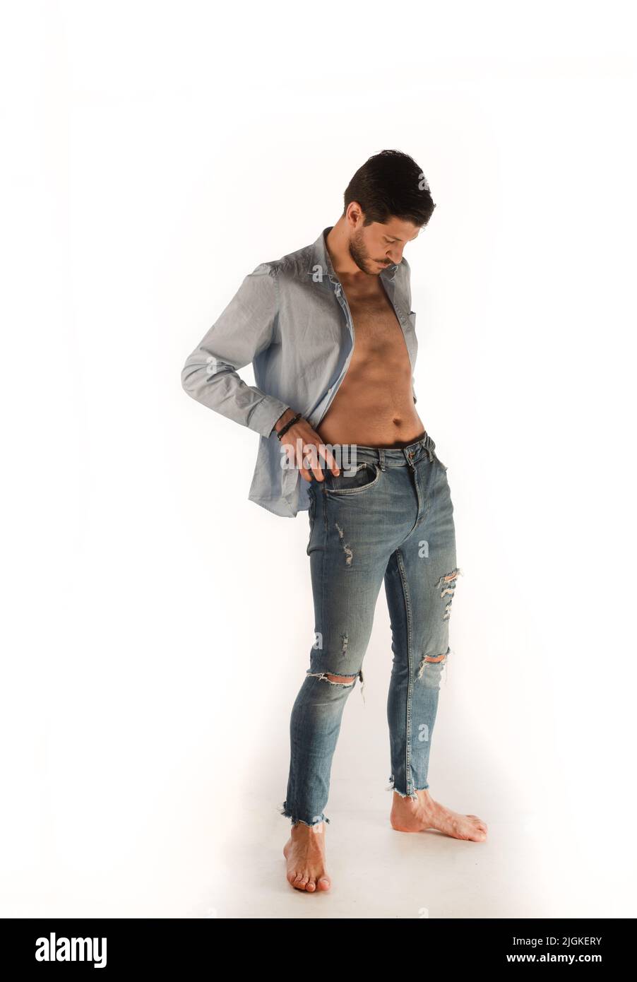 Adult fashion model doing seductive poses in the studio Stock Photo - Alamy