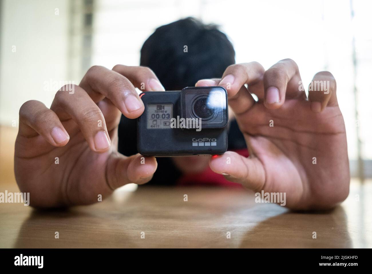 Pusle Using His Camera A bangladeshi male using his camera. Dhaka, Bangladesh Stock Photo - Alamy