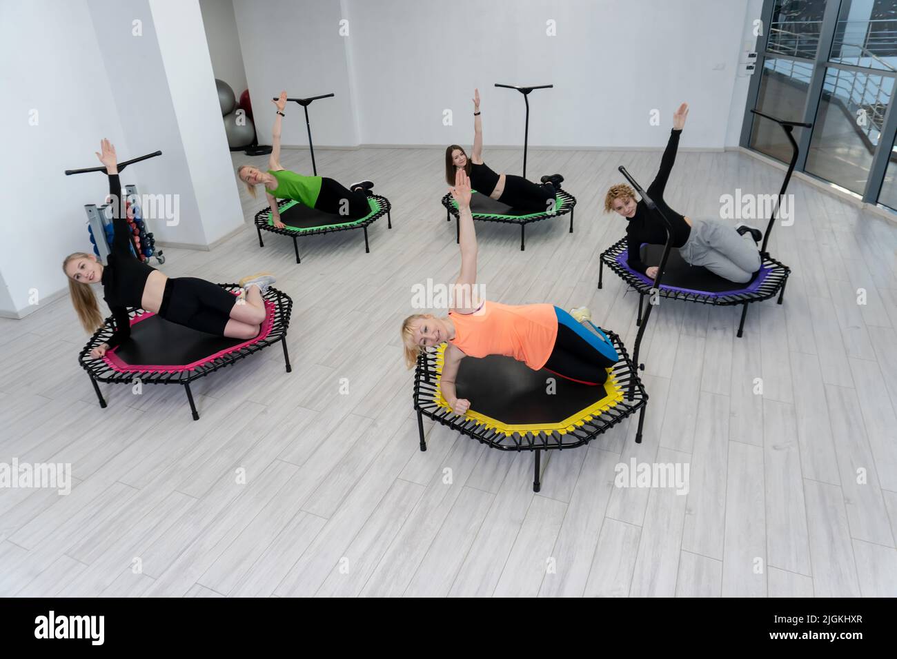Lie down trampoline active fitness group center friends youth athlete activity, concept training athletic from exercise from gym happiness, class Stock Photo