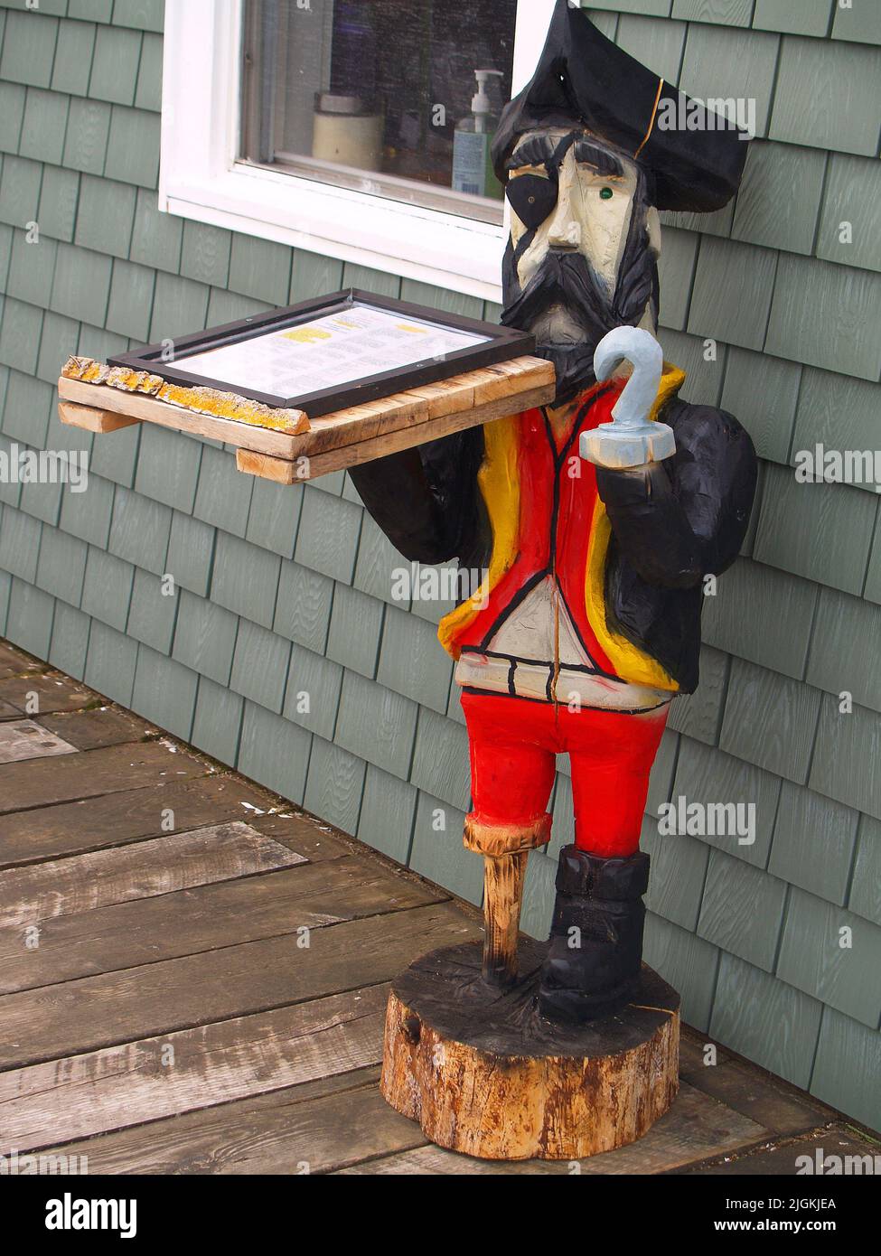 Peg leg sailor holding menu, Charlottetown, PEI Stock Photo