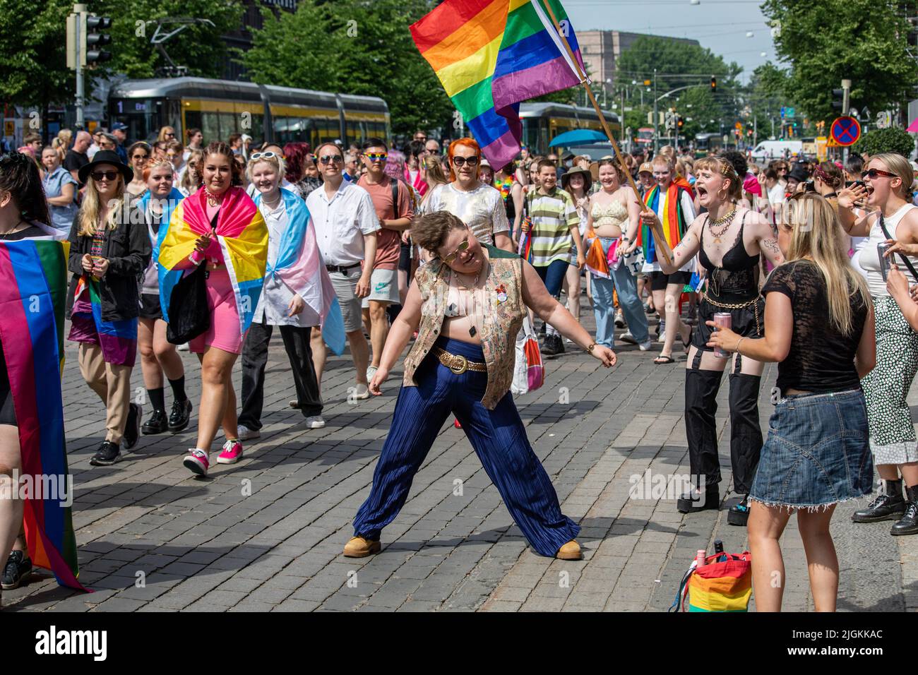 Dancing in the street at Helsinki Pride 2022 Parade in Mannerheimintie, Helsinki, Finland. Stock Photo