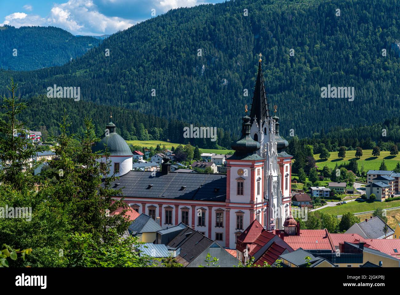 Beautiful aerial view of Mariazell Basilica, a Roman Catholic church, on sunny summer day with the Alps and blue sky cloud, Styria, Austria Stock Photo