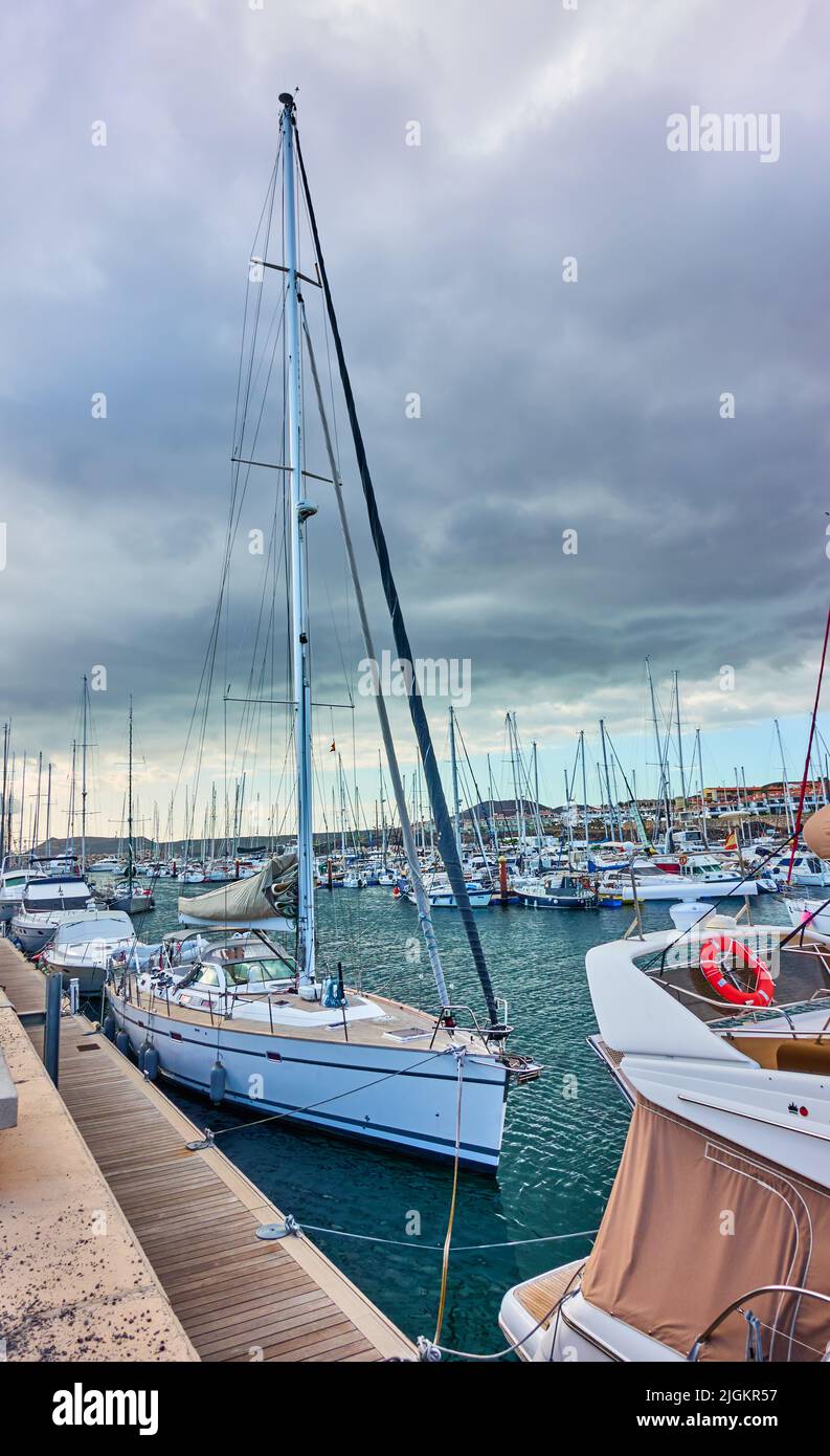 Golf del Sur, Tenerife, Spain - December 7, 2019: Sail yacht with tall mast at Marina San Miguel Stock Photo
